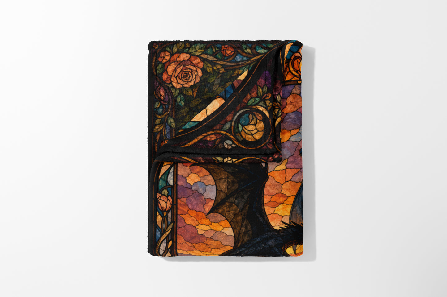 Fleece blanket featuring a stained glass dragon and roses design in warm tones.
