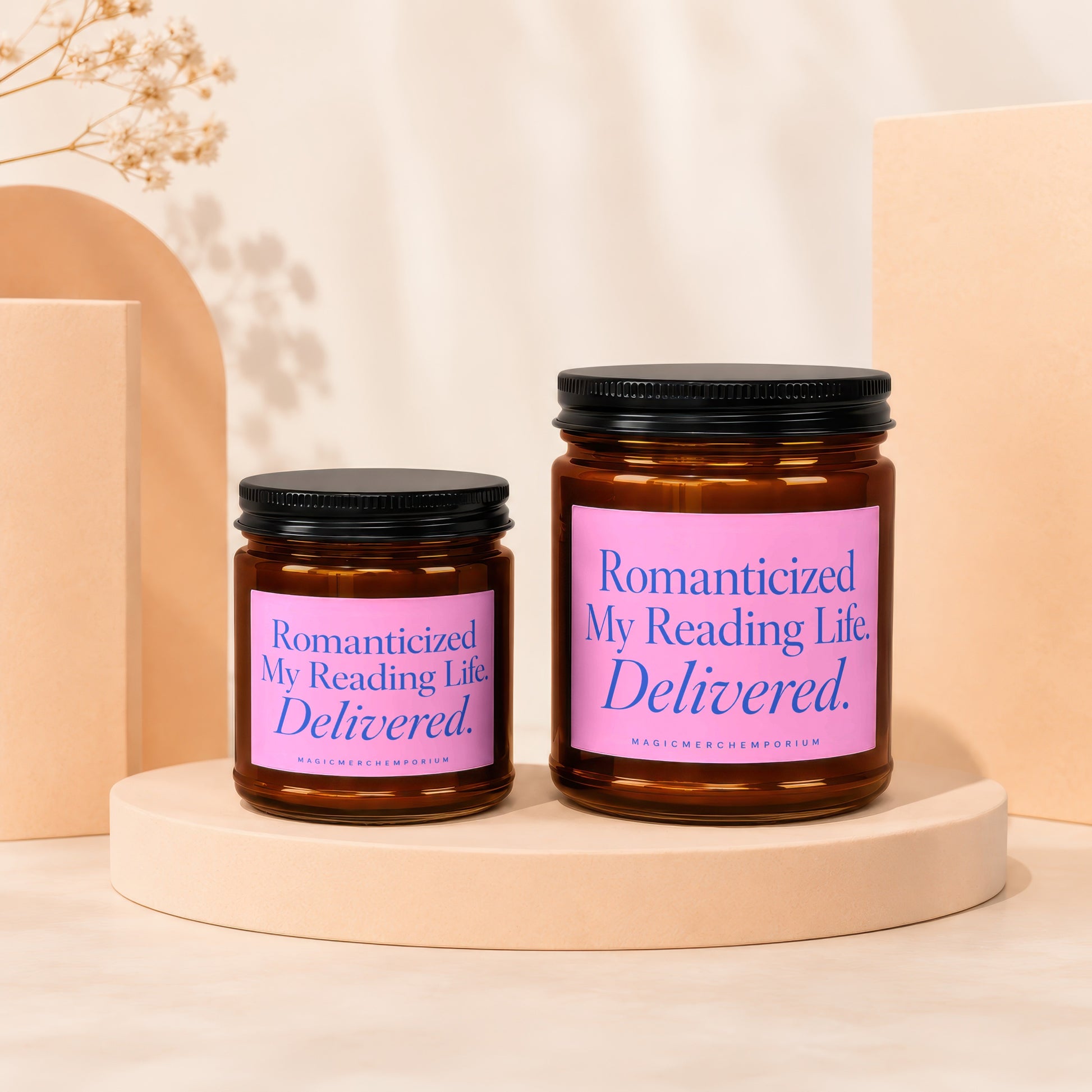 Two amber jars with black lids. Pink labels read: "Romanticized My Reading Life. Delivered."