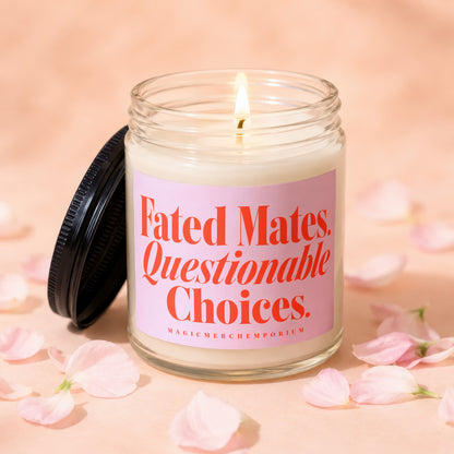 Glass candle with pink label reading "Fated Mates. Questionable Choices."