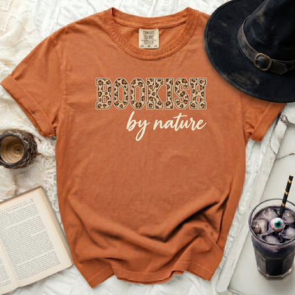 Orange t-shirt with "Bookish by Nature" text and leopard print.