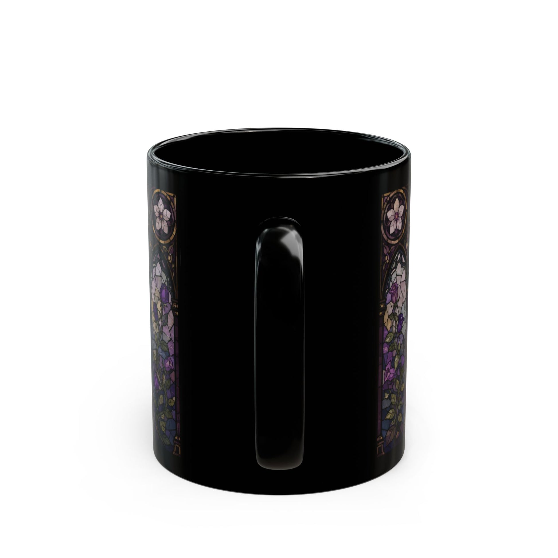 Black mug with stained glass style floral pattern on sides.