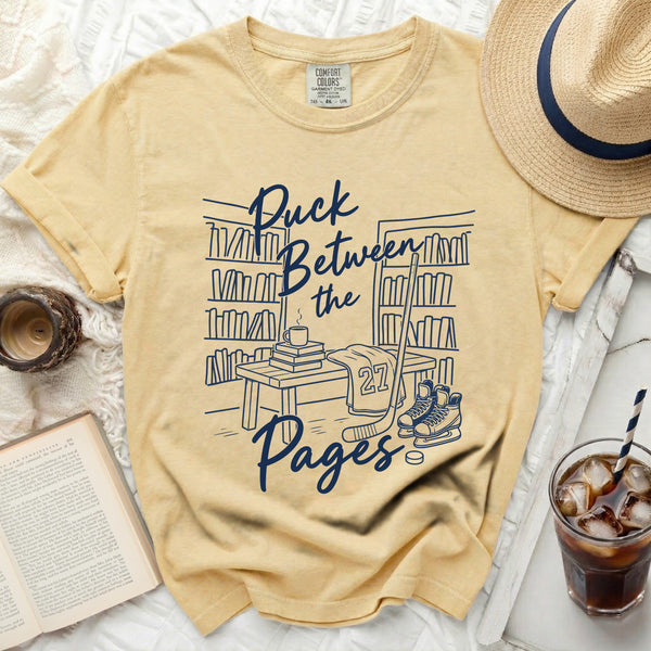 Puck Between the Pages Hockey Tee in Butter