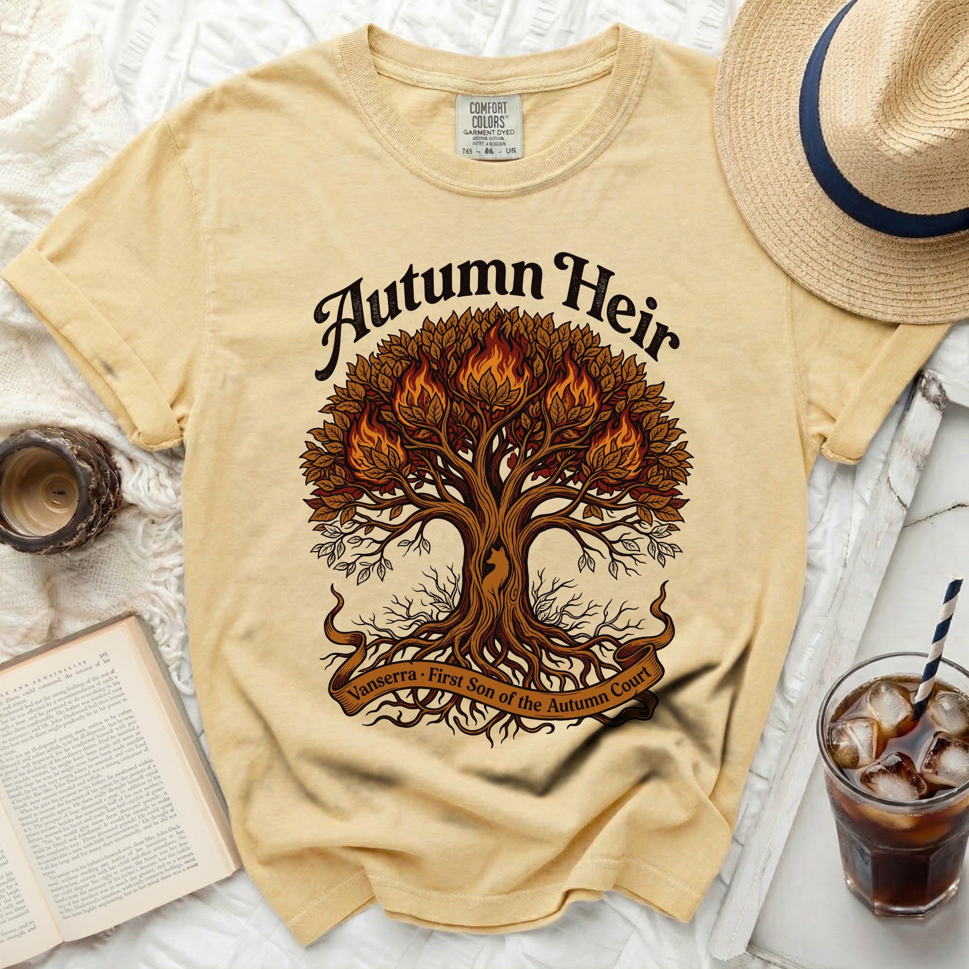 Yellow t-shirt with a fiery tree and banner text "Vanserra - First Son of the Autumn Court".