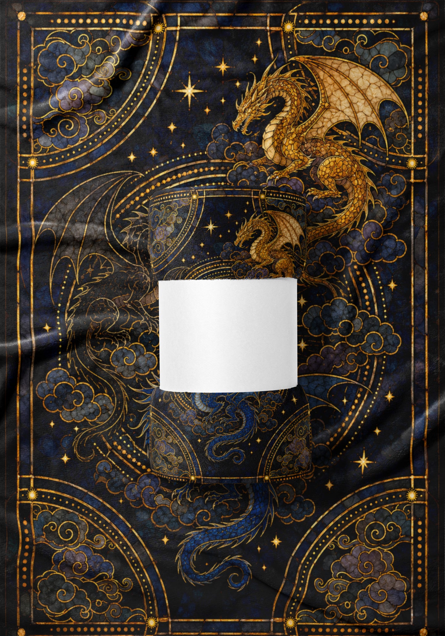 Rolled blanket with golden dragons and celestial patterns on dark blue fabric.