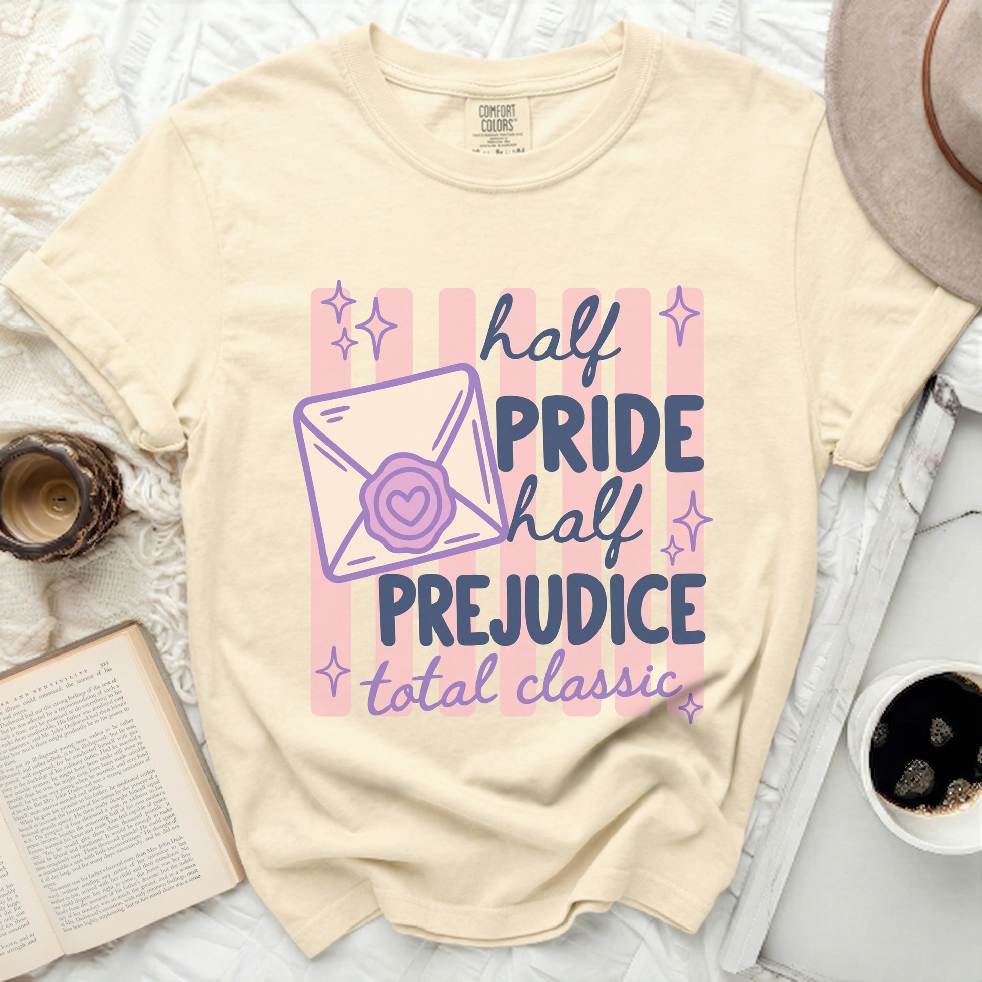 “Half Pride, Half Prejudice, Total Classic” graphic tee with envelope design.