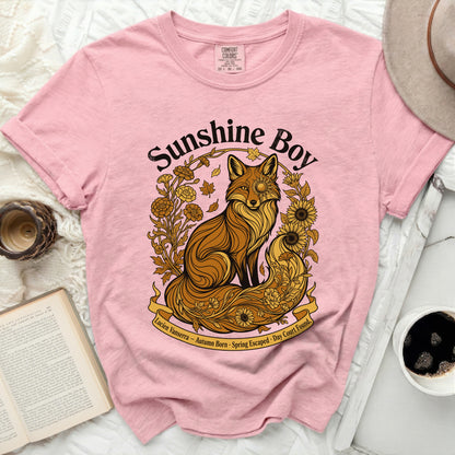 Pink t-shirt with a fox illustration and text "Sunshine Boy" and "Lucien Vanserra – Autumn Born · Spring Escaped · Day Court Found".