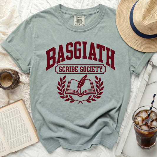 Teal t-shirt with "Basgiath Scribe Society" text and open book graphic.