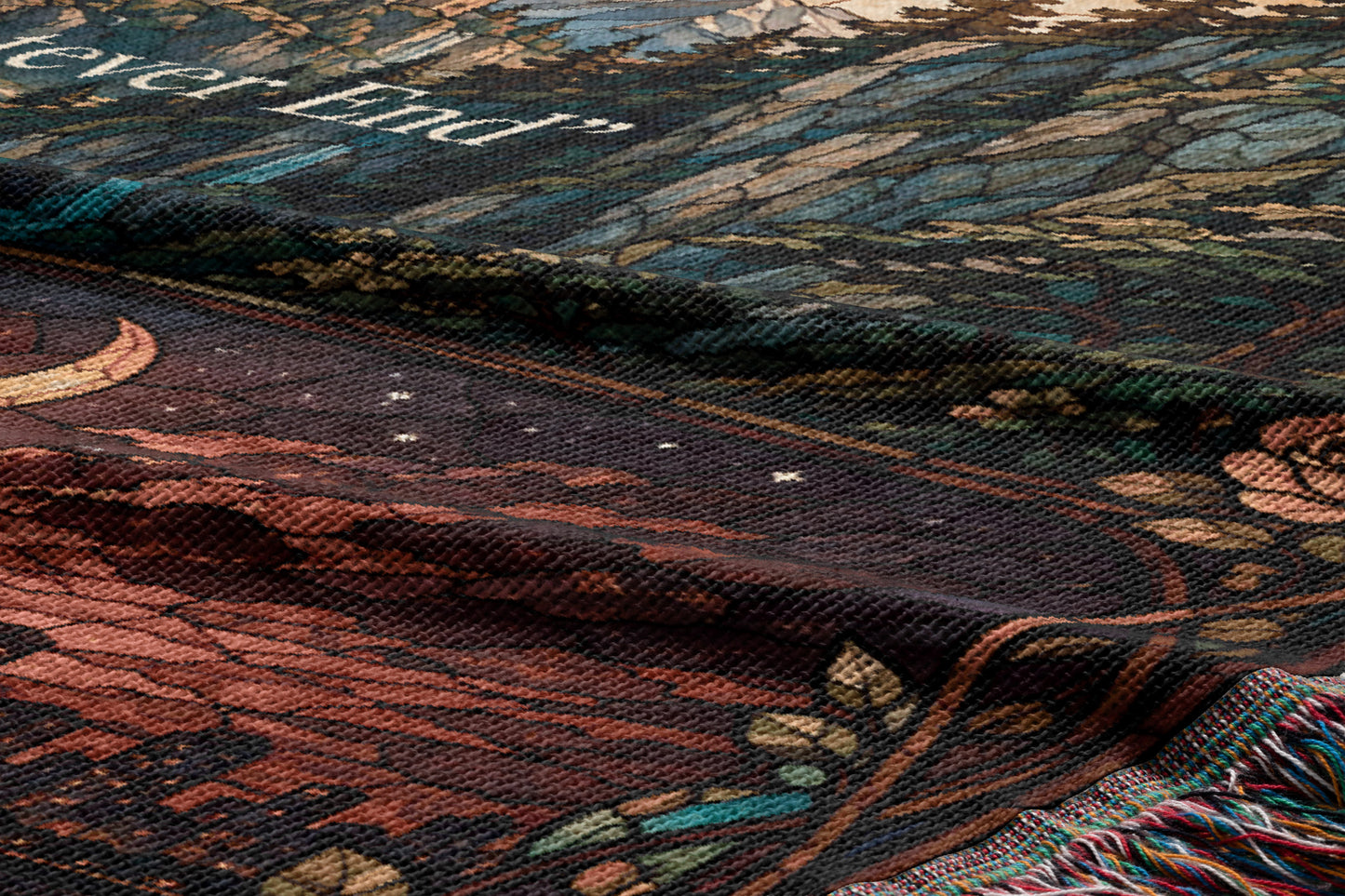 a close-up view of a colorful, textured fabric with a floral pattern. The fabric appears to be a blanket or textile with a detailed design.