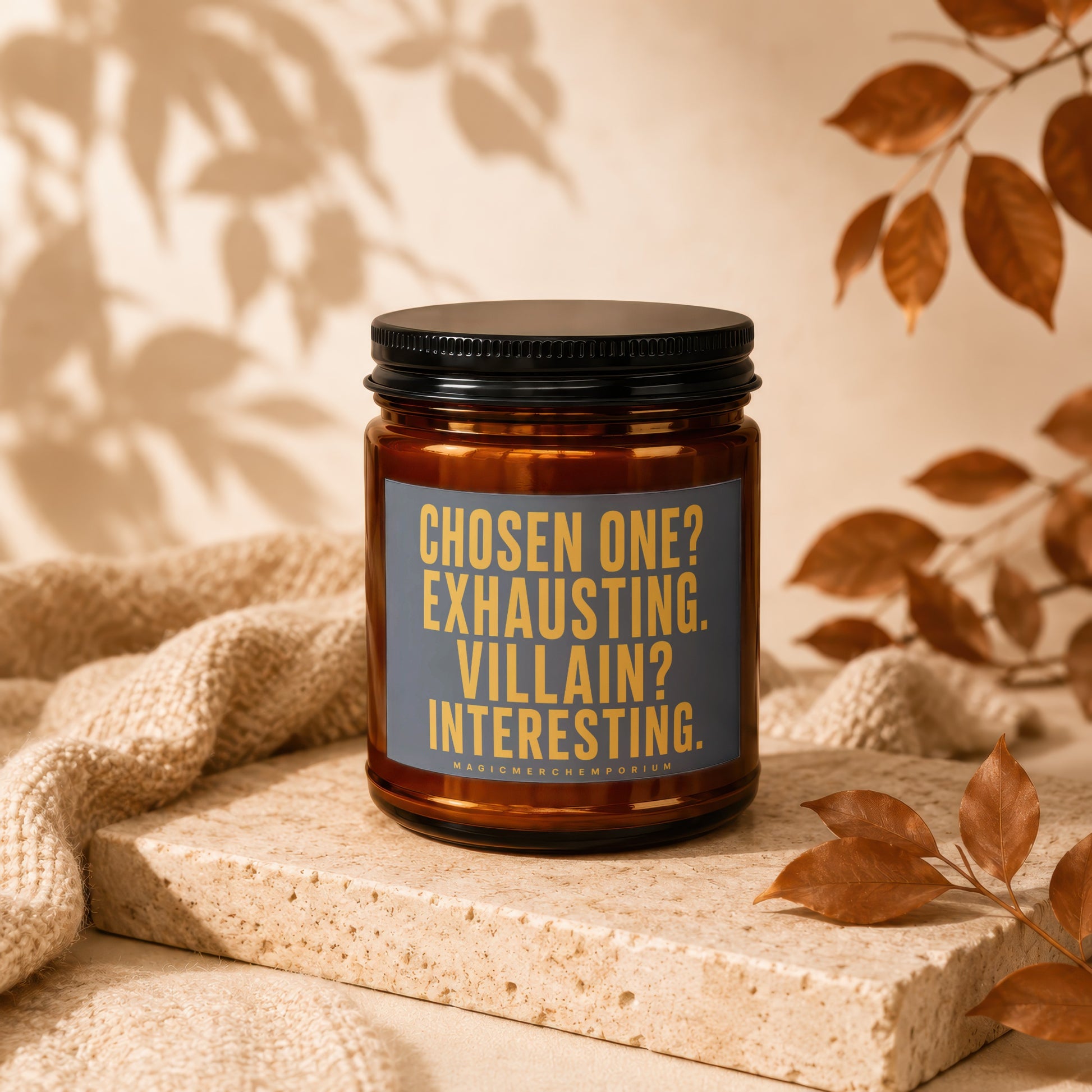 Brown glass candle with label text "Chosen One? Exhausting. Villain? Interesting."