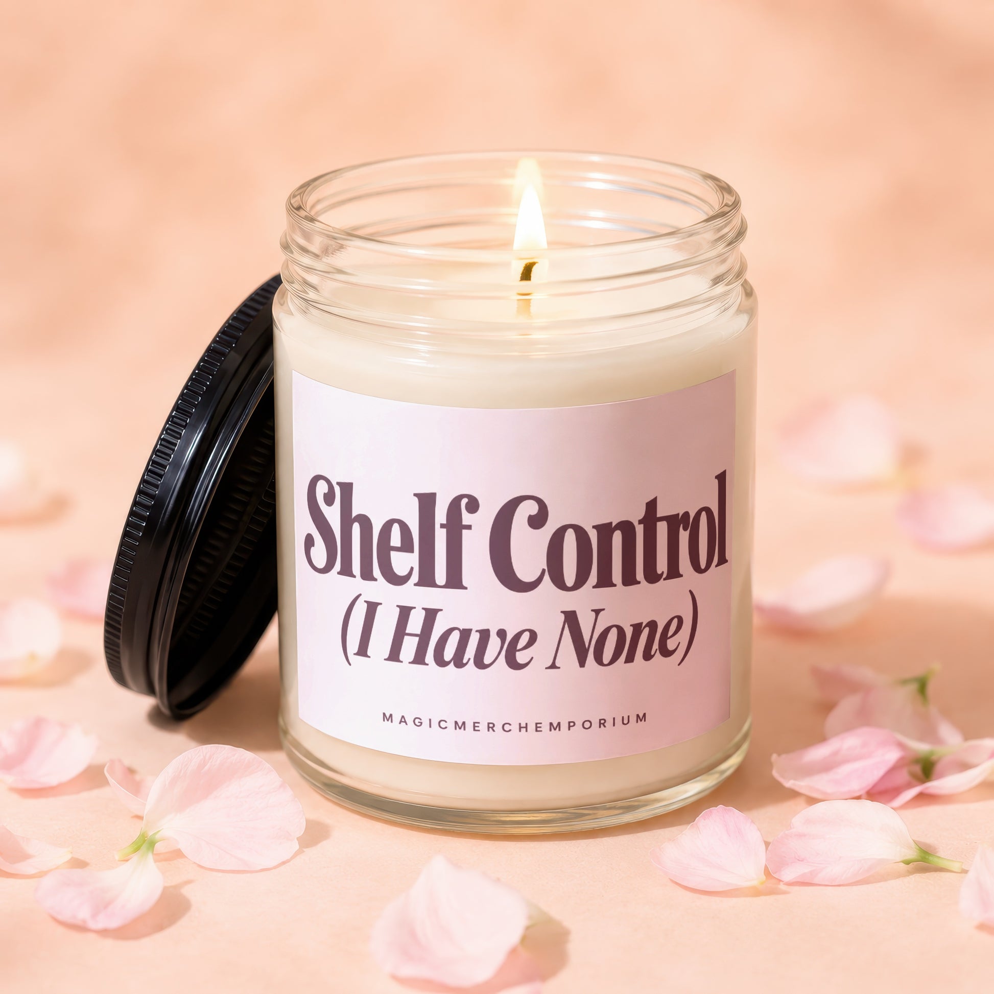 Candle with lit wick, "Shelf Control (I Have None)" text, and scattered petals.