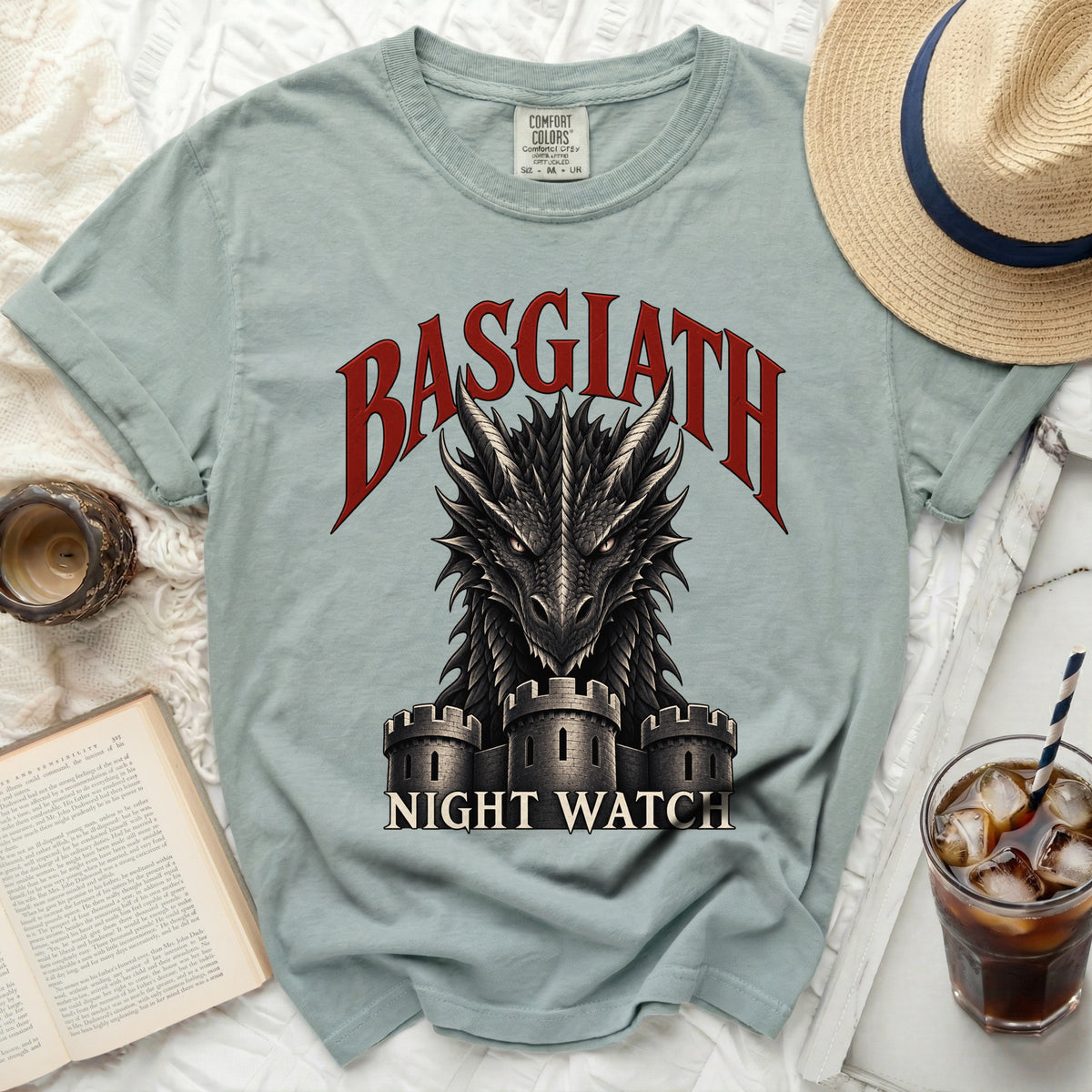 Light blue t-shirt with "BASGIATH NIGHT WATCH" text and dragon graphic.