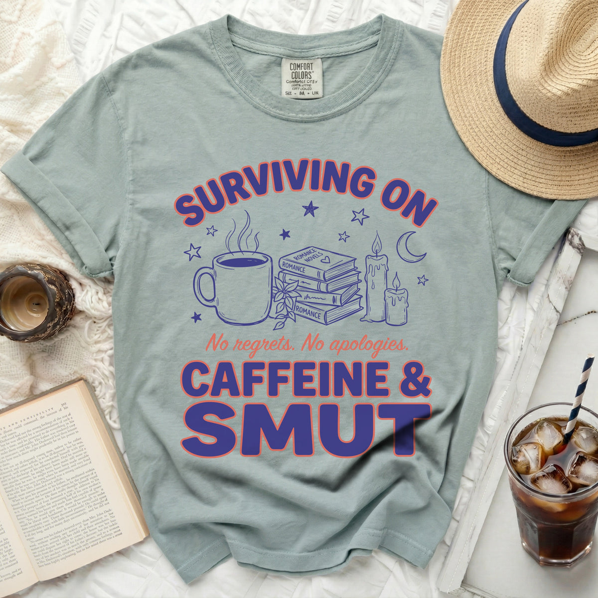 Surviving on caffeine and smut t-shirt with coffee, books, and candles.