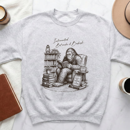 Sweatshirt with Bigfoot reading, saying "Introverted. But make it Bookish."
