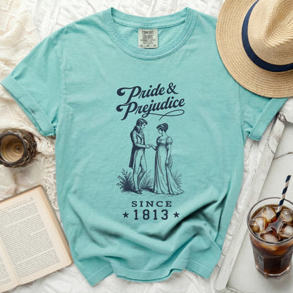 Turquoise t-shirt with "Pride & Prejudice since 1813" and drawn couple.