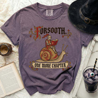Purple t-shirt with "Forsooth, One More Chapter" and knight on snail graphic.