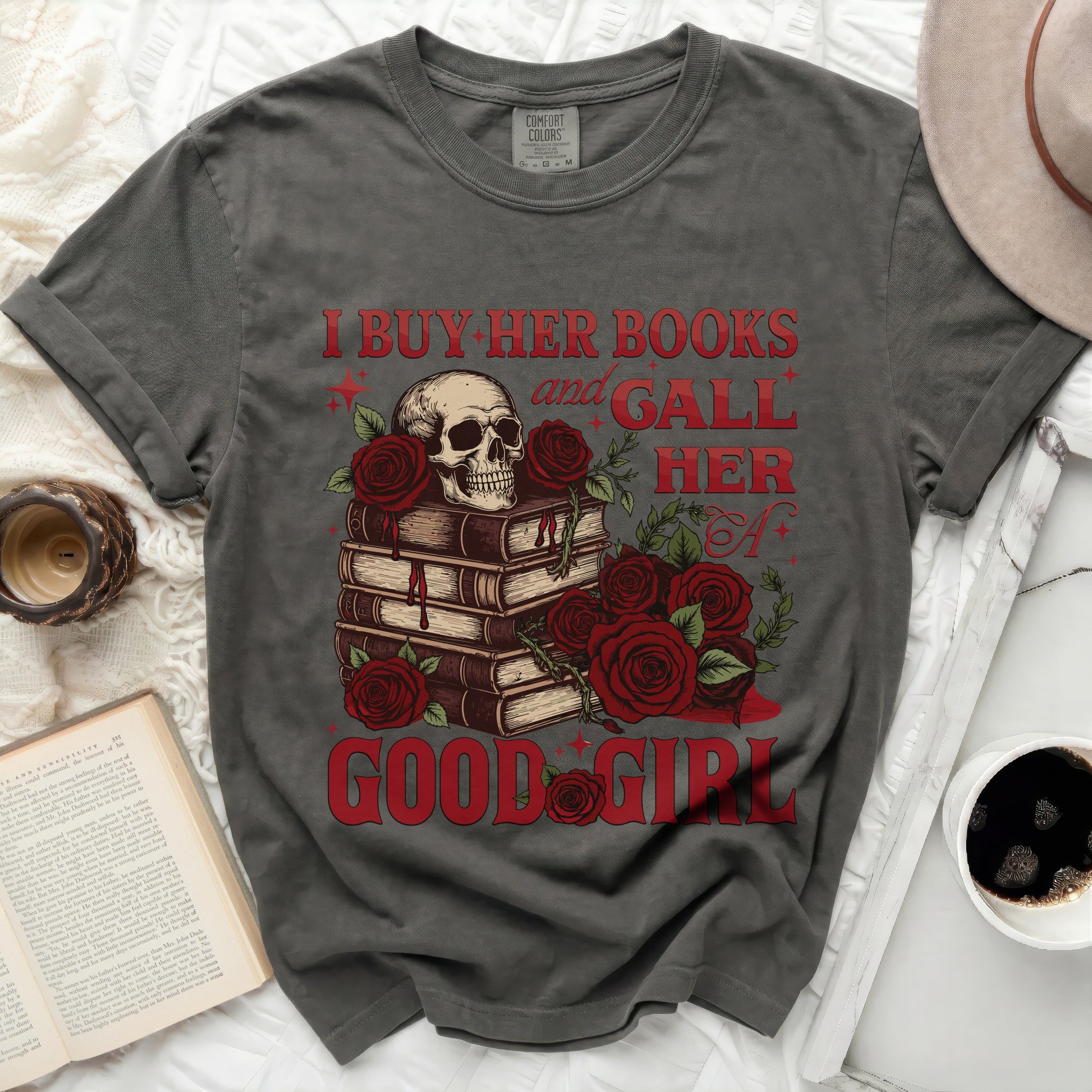 Skull with roses and books, text "I BUY HER BOOKS and GALL HER A GOOD GIRL".