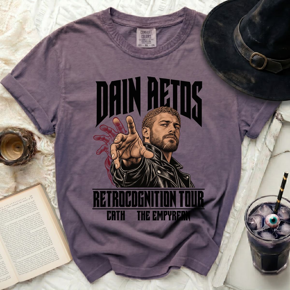 Purple t-shirt with "Dain Aetos Retrocognition Tour" graphic.