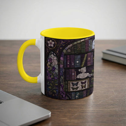 Mug with yellow handle and rim featuring a stained glass design of books, butterflies, and roses.