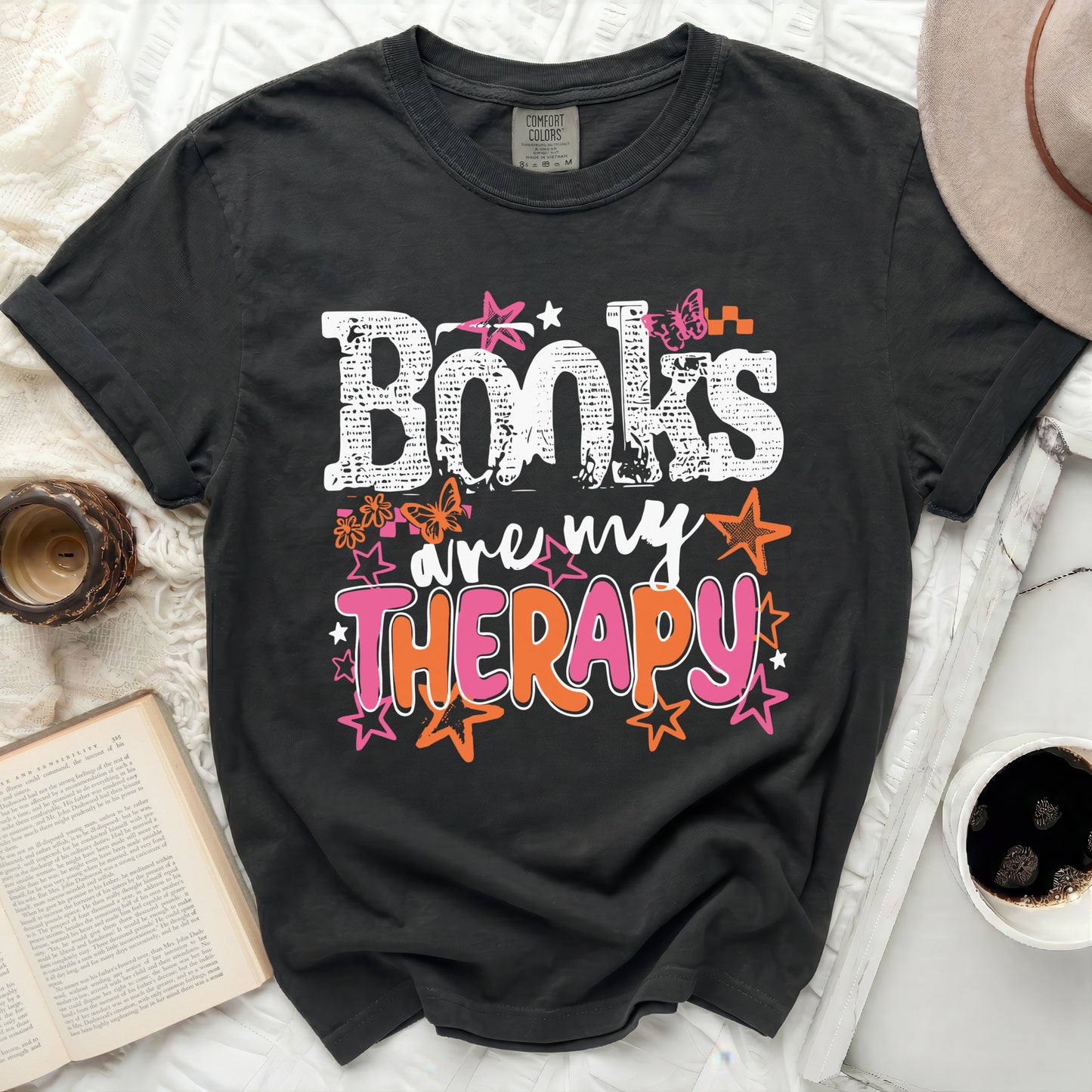 Dark t-shirt with "Books are my Therapy" graphic and butterflies.