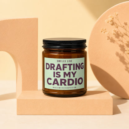 Brown candle in jar with "Smells like Drafting is my Cardio" label.