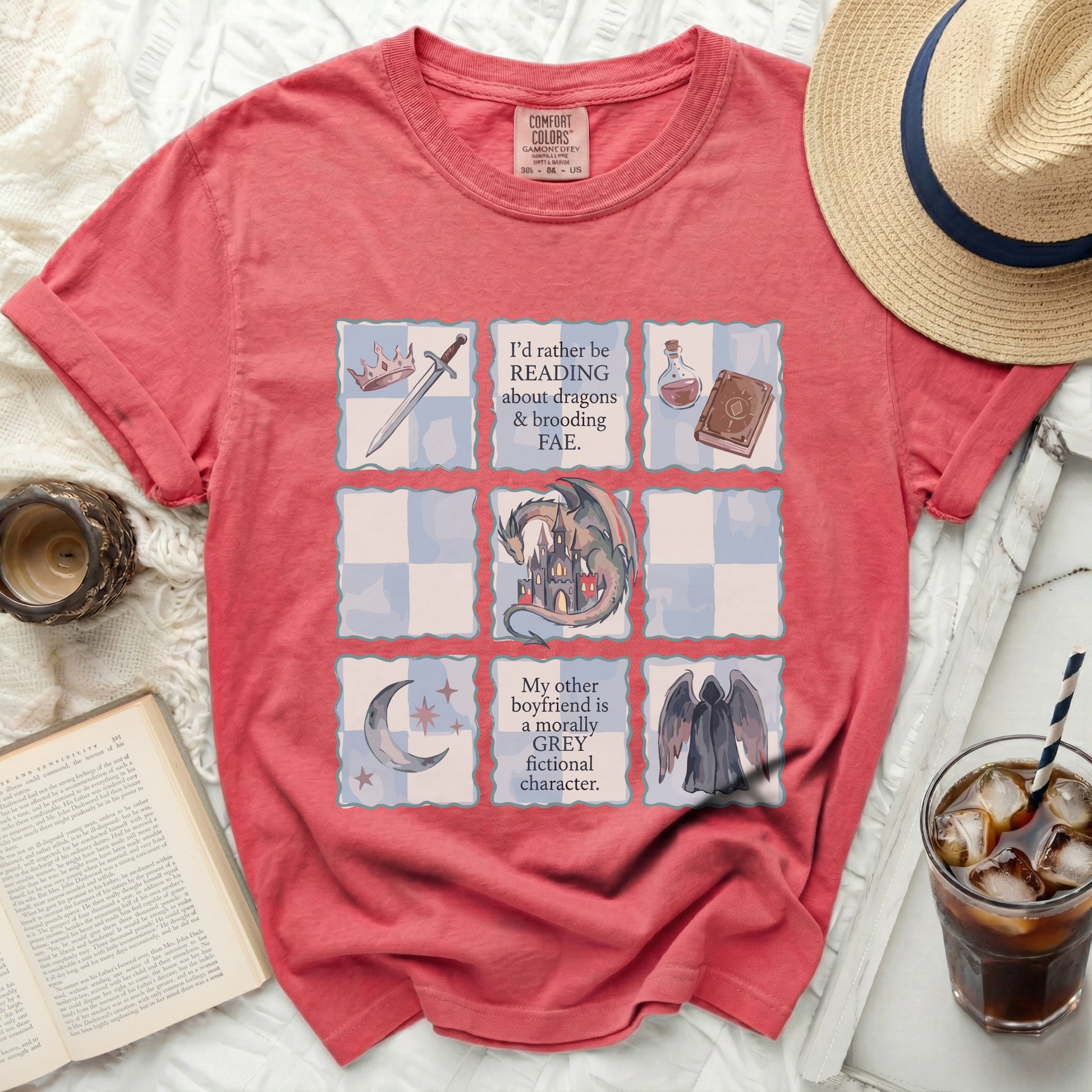 Coral t-shirt with grid graphic and fantasy text.