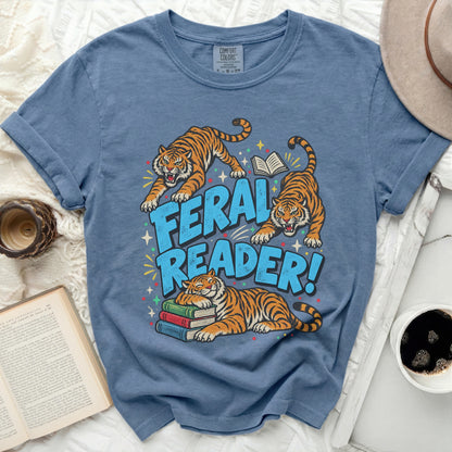Feral Reader text with three tigers, one sleeping on books.