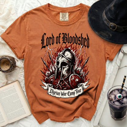 Orange t-shirt with "Lord of Bloodshed" and "Illyrian War Camp Tour" graphic.