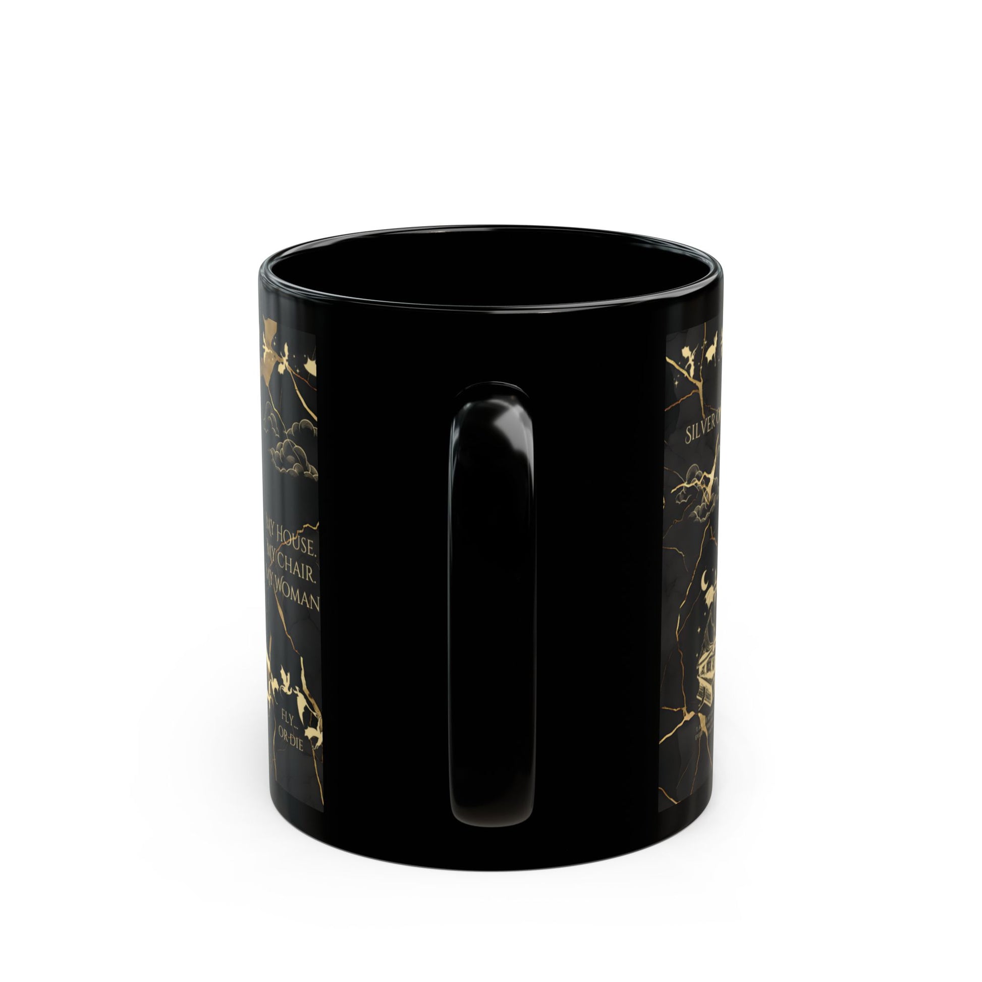 a black cup with gold designs on it
