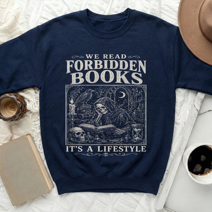 Navy sweatshirt with "We Read Forbidden Books It's a Lifestyle" text and gothic illustration.