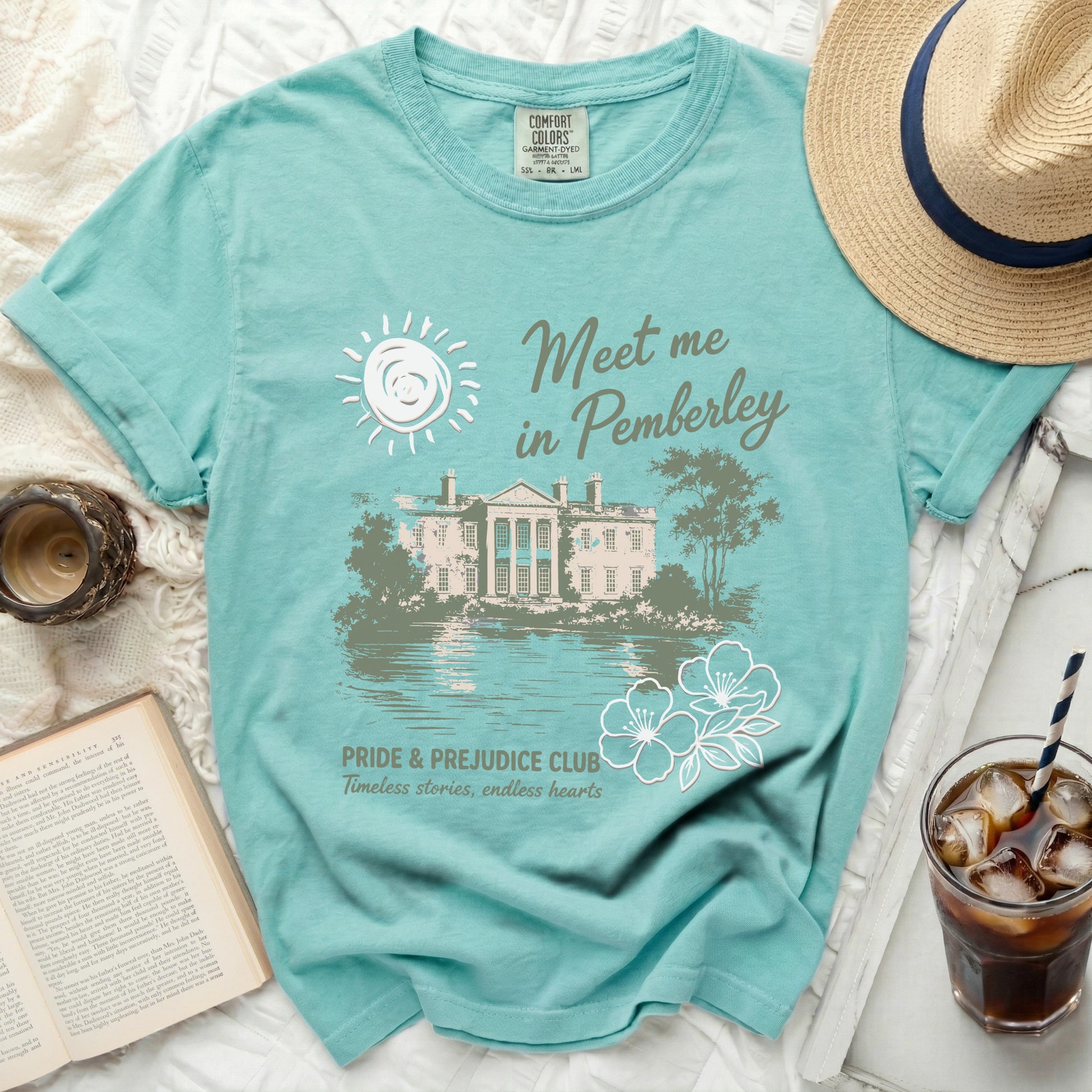 Aqua t-shirt with "Meet me in Pemberley" and "Pride & Prejudice Club" graphic.