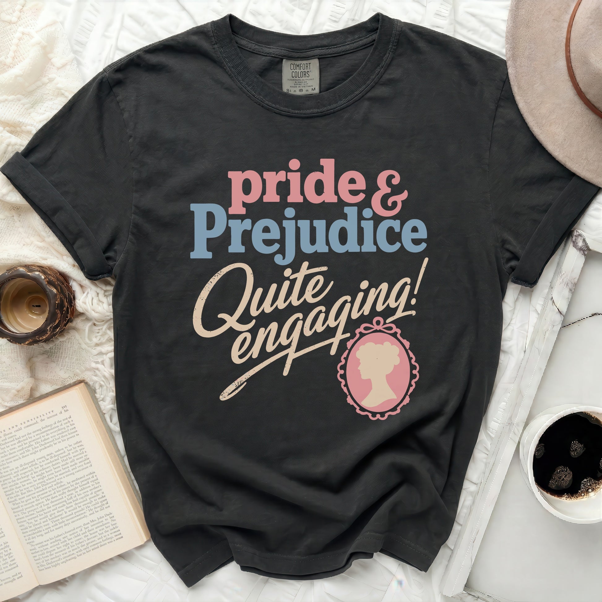 Black t-shirt with "Pride & Prejudice Quite Engaging!" text and cameo.