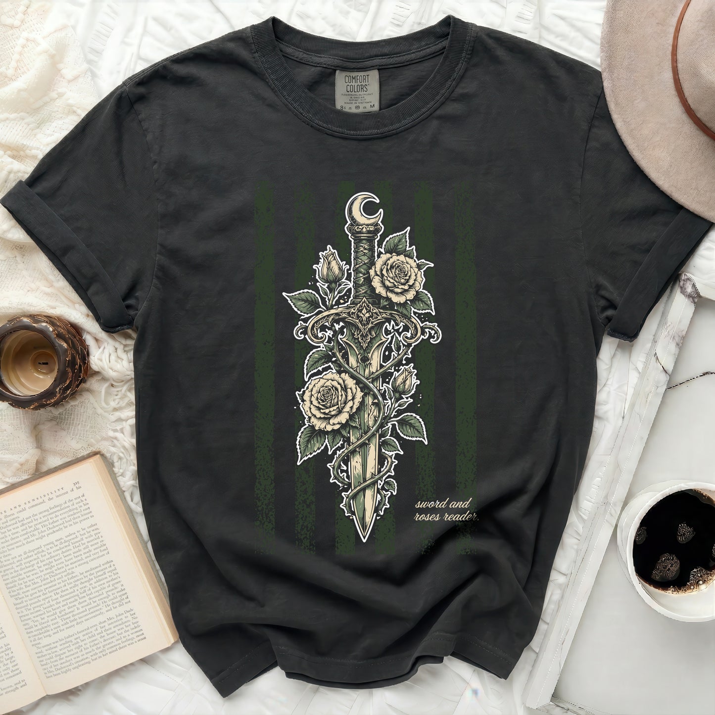 Black t-shirt with sword and roses graphic and text "sword and roses reader".