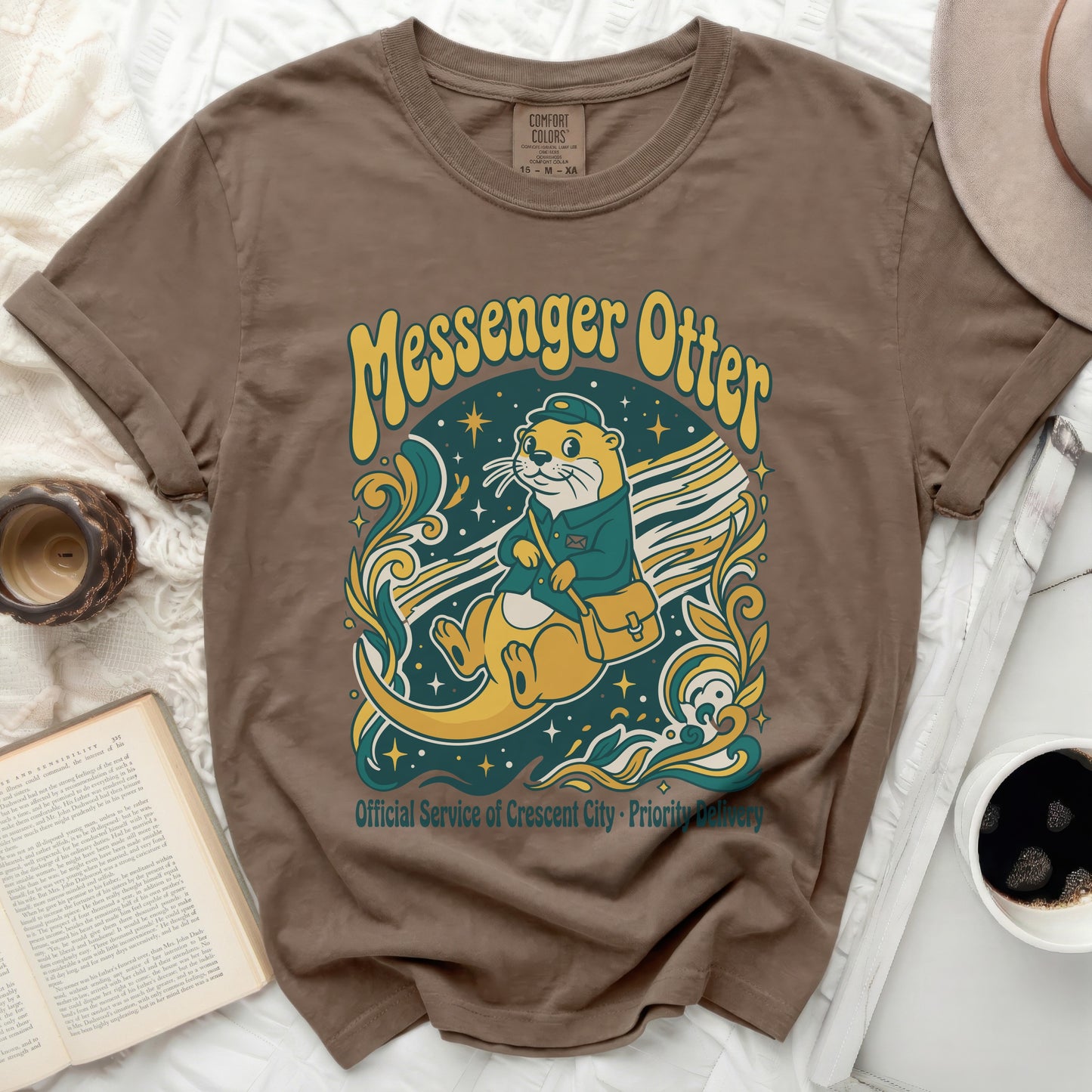 T-shirt featuring a retro illustration of a messenger otter with text.