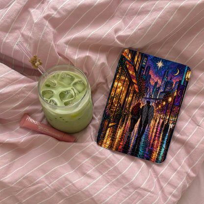 IPhone case with angel wings couple and city at night; iced matcha latte; Rhode lip balm.
