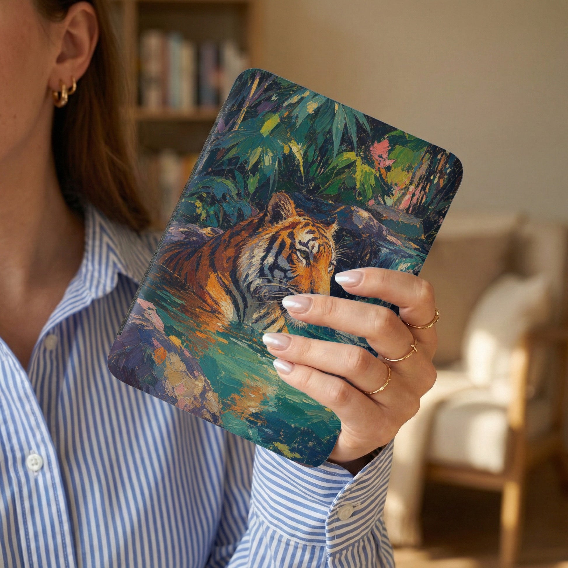 Tablet case with a vibrant oil painting of a tiger in a jungle setting.