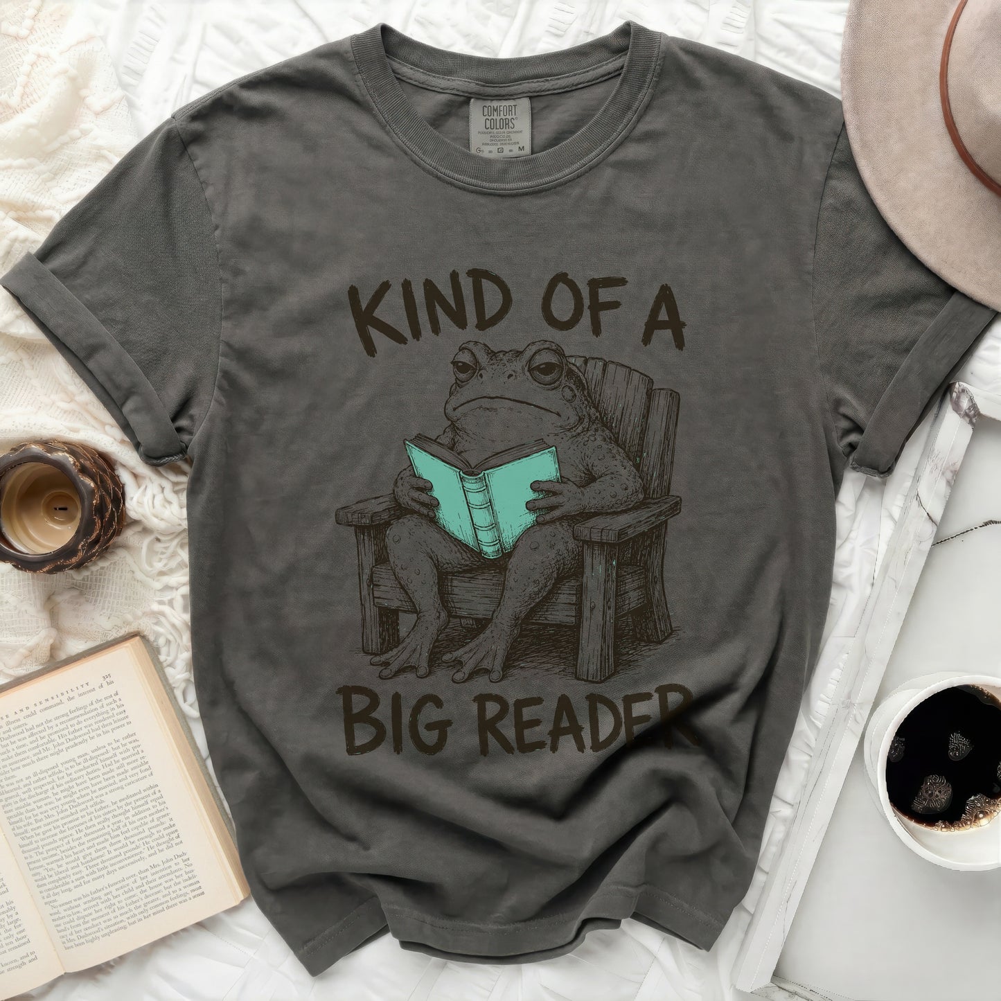 Dark gray t-shirt with a toad reading a book, "Kind of a Big Reader" text.
