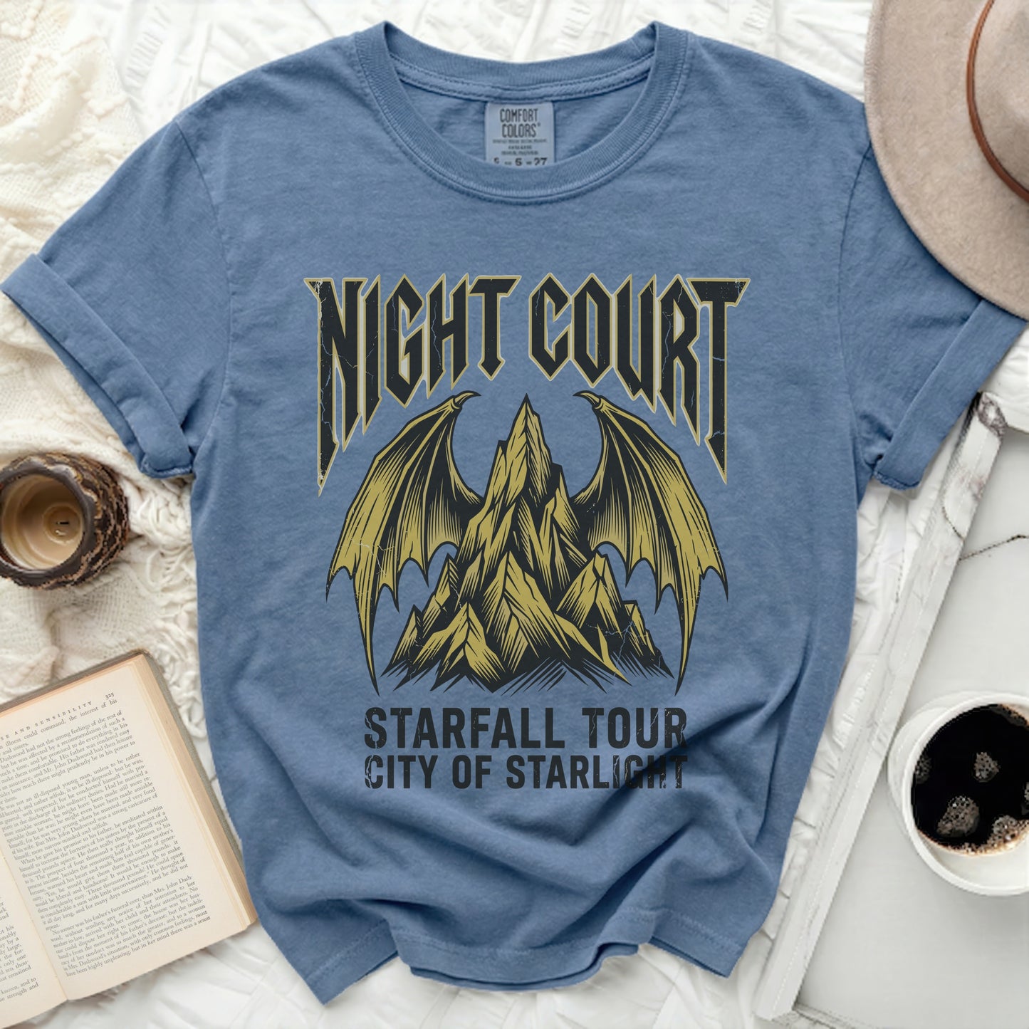 Blue t-shirt with "Night Court Starfall Tour City of Starlight" graphic.