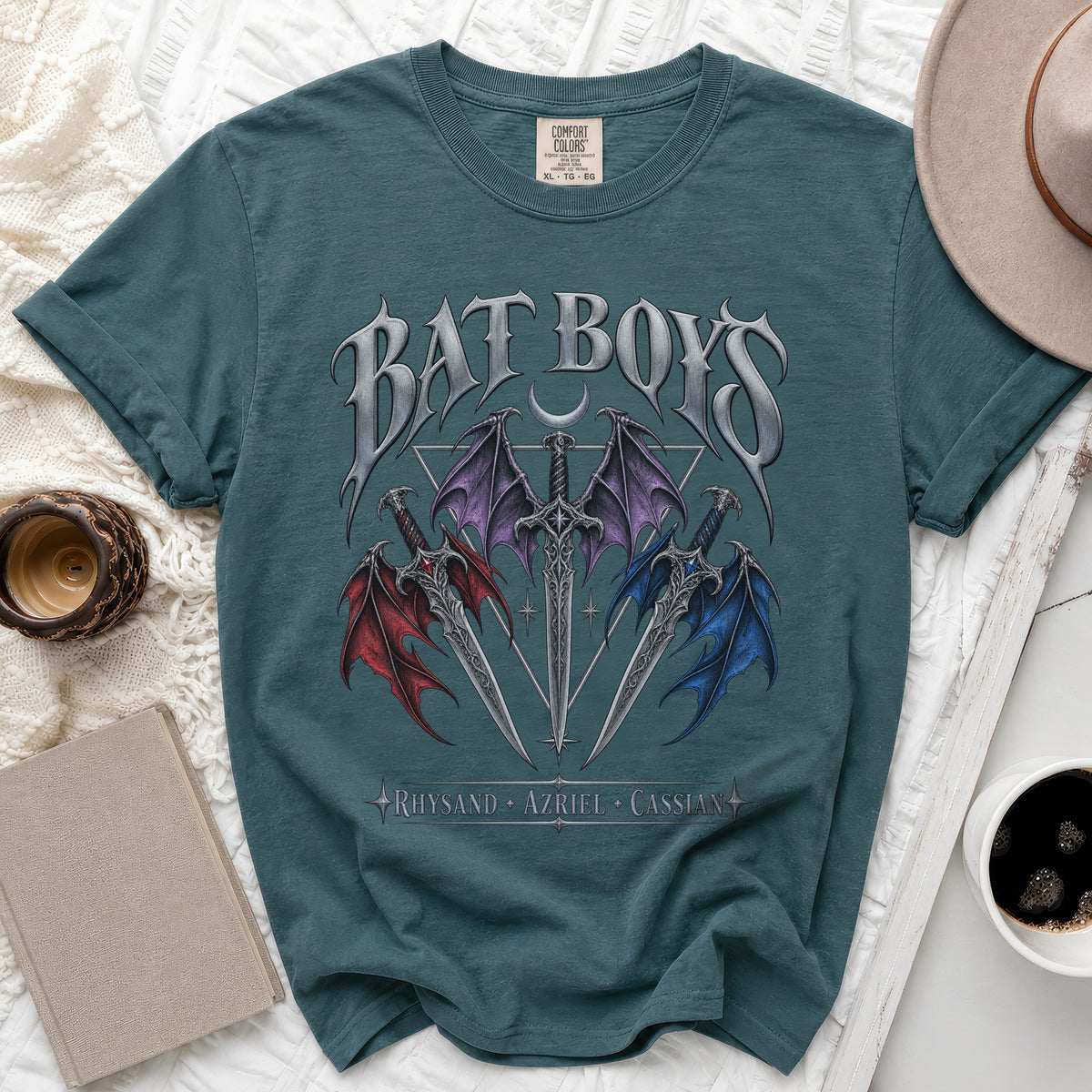 Teal t-shirt with "BAT BOYS" text, swords, bat wings, and names: Rhysand, Azriel, Cassian.