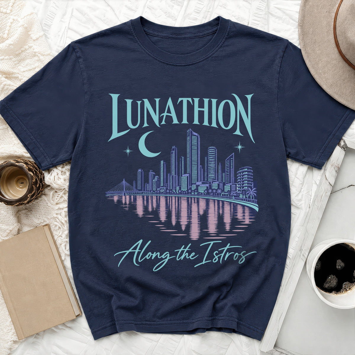 Navy t-shirt with "LUNATHION Along the Istros" text and cityscape graphic.