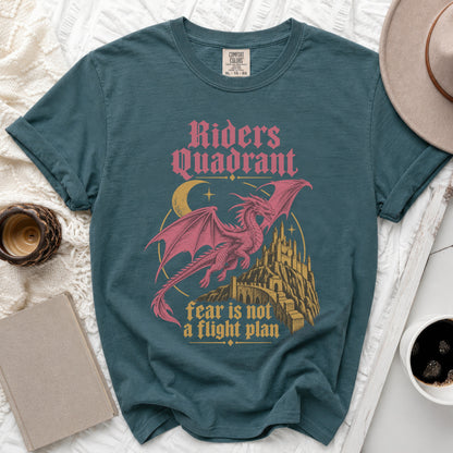Teal t-shirt with pink dragon, castle, moon, and text: "Riders Quadrant fear is not a flight plan."