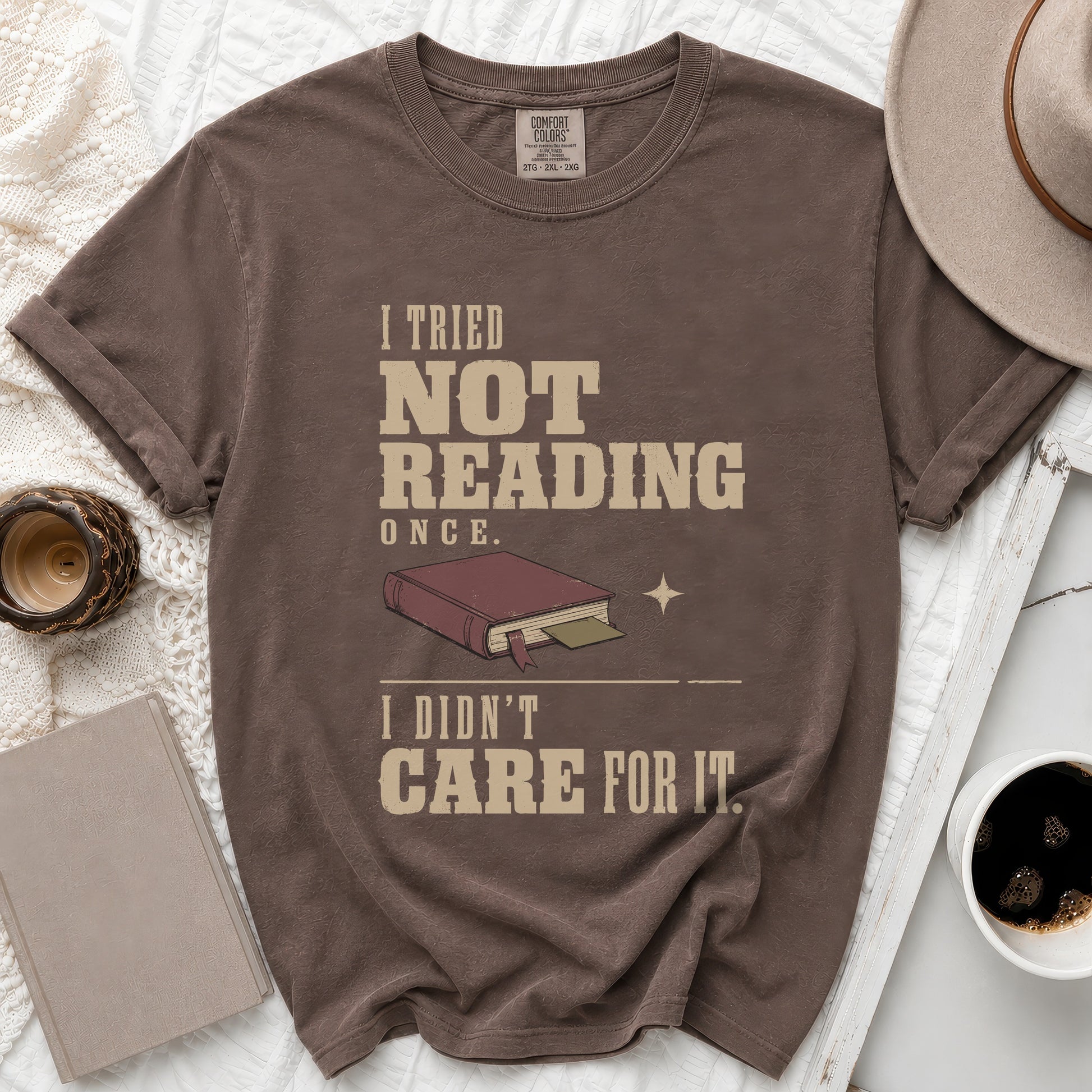 Brown t-shirt with "I tried not reading once. I didn't care for it." text.