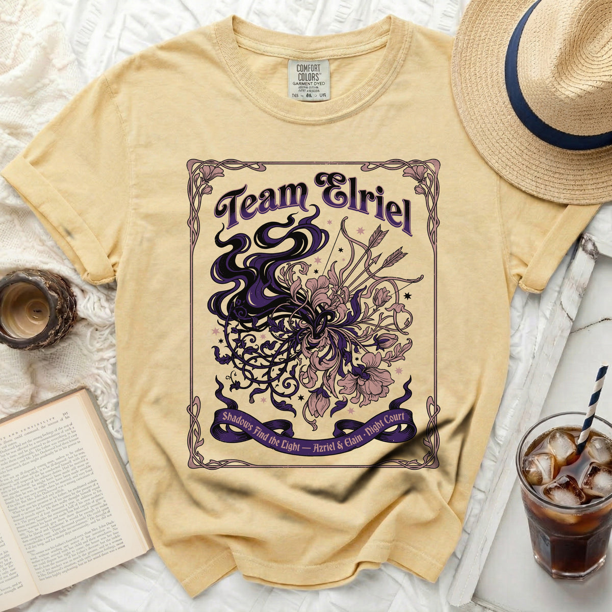 Yellow t-shirt with "Team Elriel" and floral artwork.