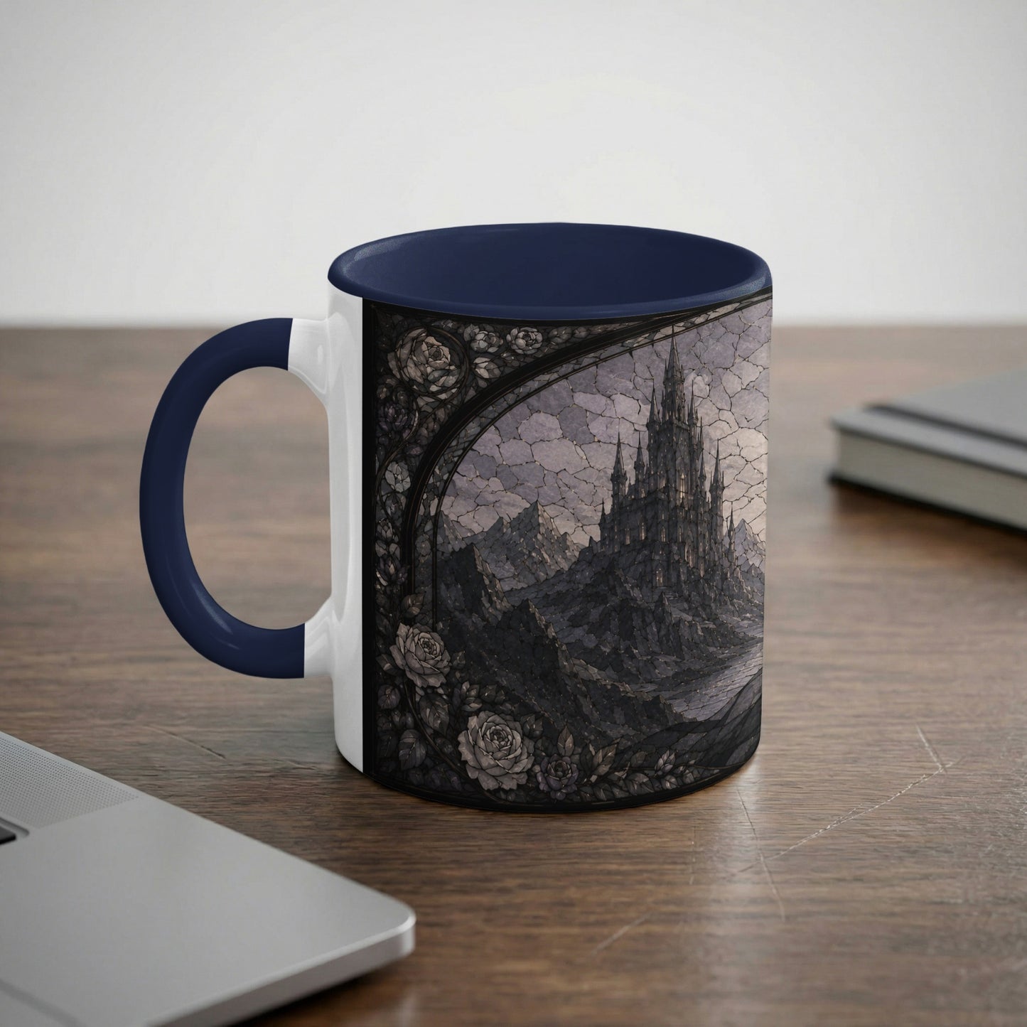 Mug with a gothic castle and rose design, navy blue handle.