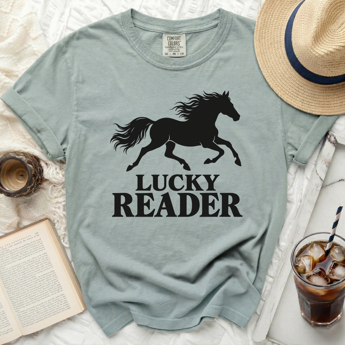 T-shirt with black running horse and "Lucky Reader" text