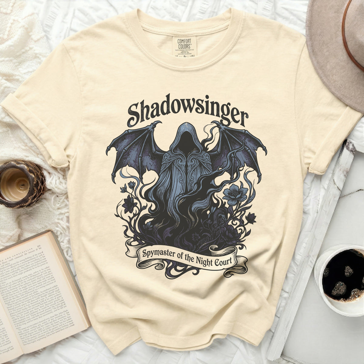 Shadowsinger, Spymaster of the Night Court graphic on a cream t-shirt.