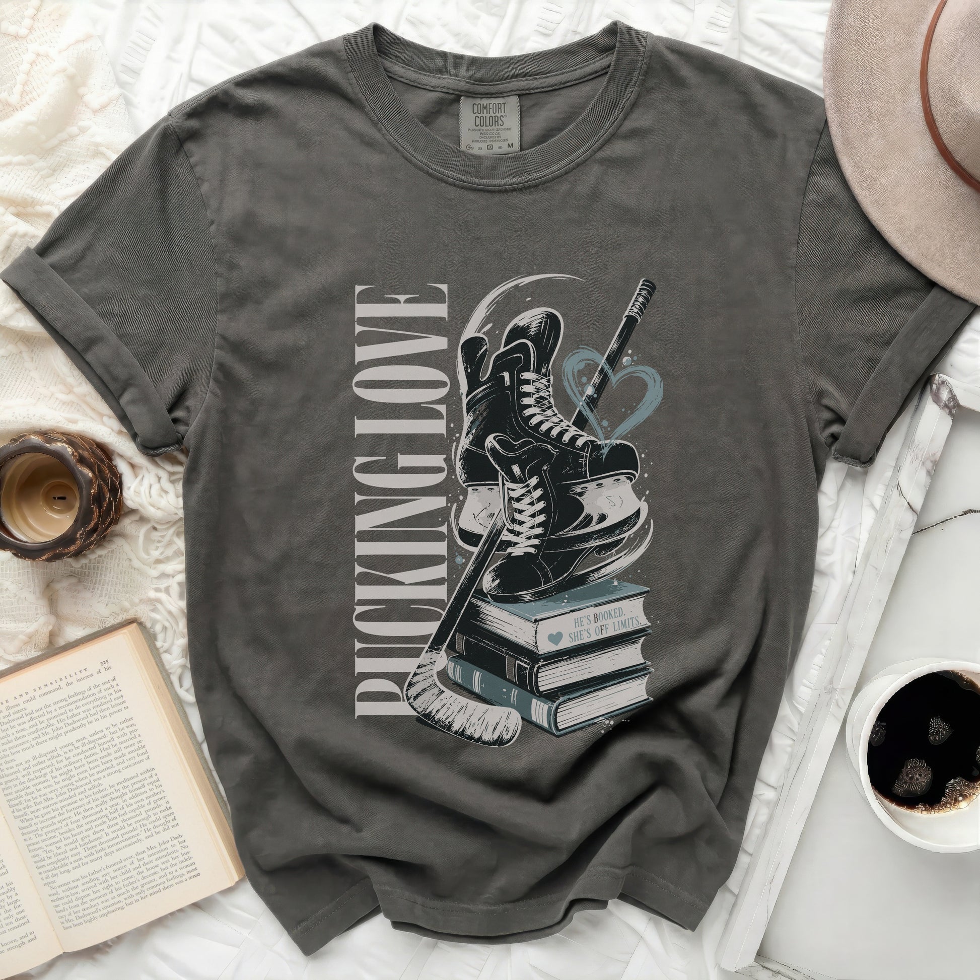 Dark grey t-shirt with "PUCKING LOVE" and hockey graphics.