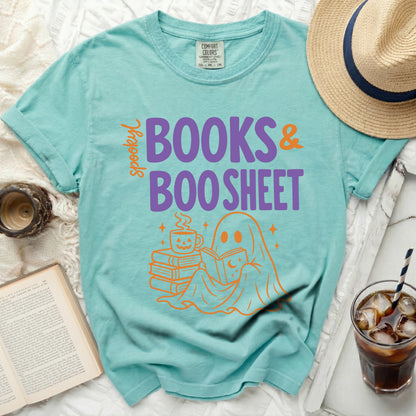 Teal Comfort Colors t-shirt with orange ghost reading and "Spooky Books & Boo Sheet" graphic.