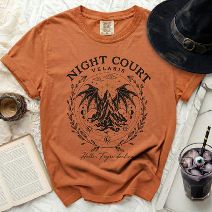 Rust-colored crewneck t-shirt featuring a black graphic of Night Court Velaris with wings and mountains.