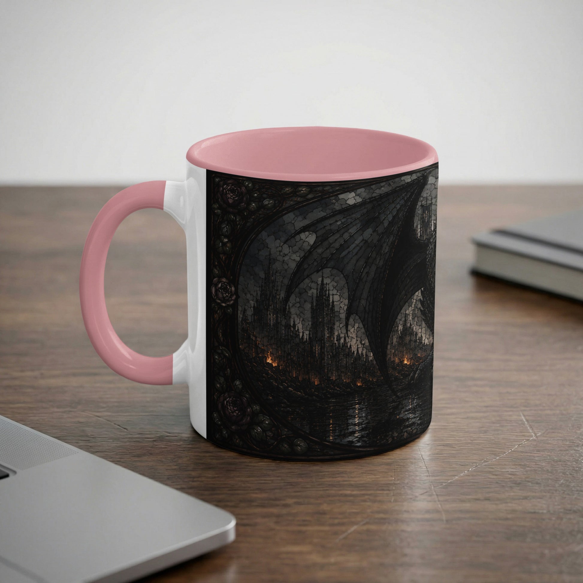Mug with pink handle features a dark gothic castle scene with dragon wings.