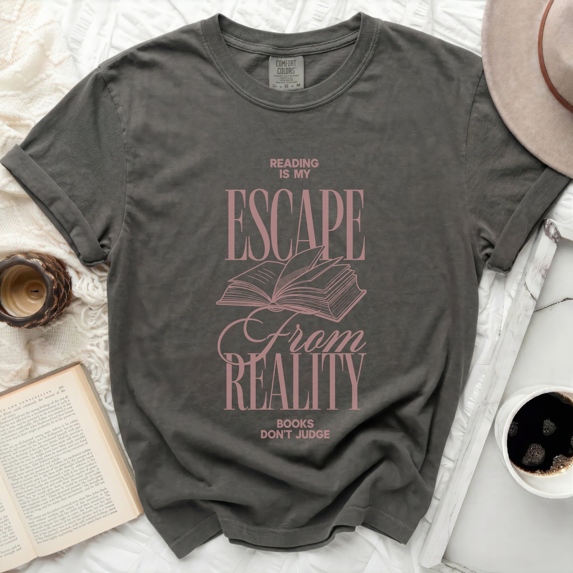 Gray t-shirt with "Reading is my escape from reality" text.